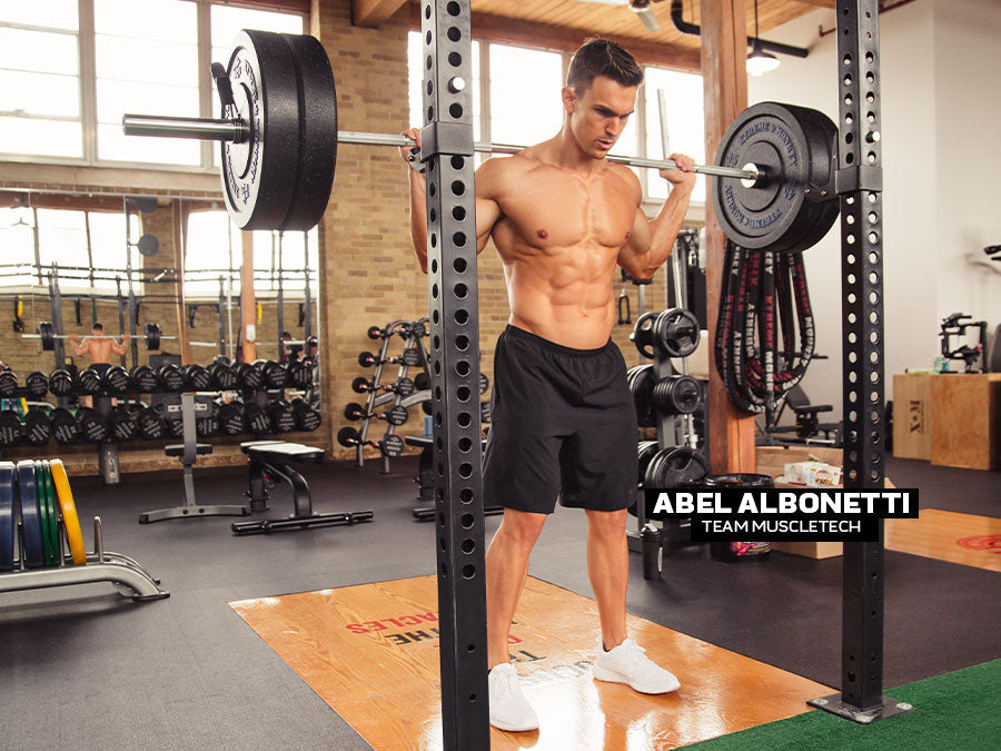 Abel performing barbell squat